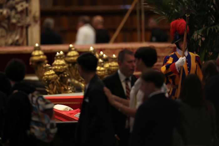 People pictured paying their respects to Pope Francis inside St. Peter's Basilica, as the late pope lay in state, at the Vatican