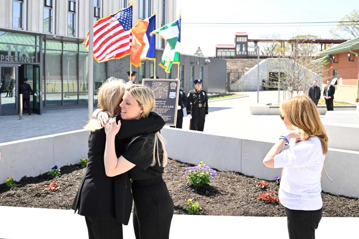 NYPD Commissioner Jessica Tisch hugs Stephanie Diller.