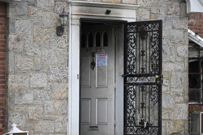 door of a house that was destroyed by fire