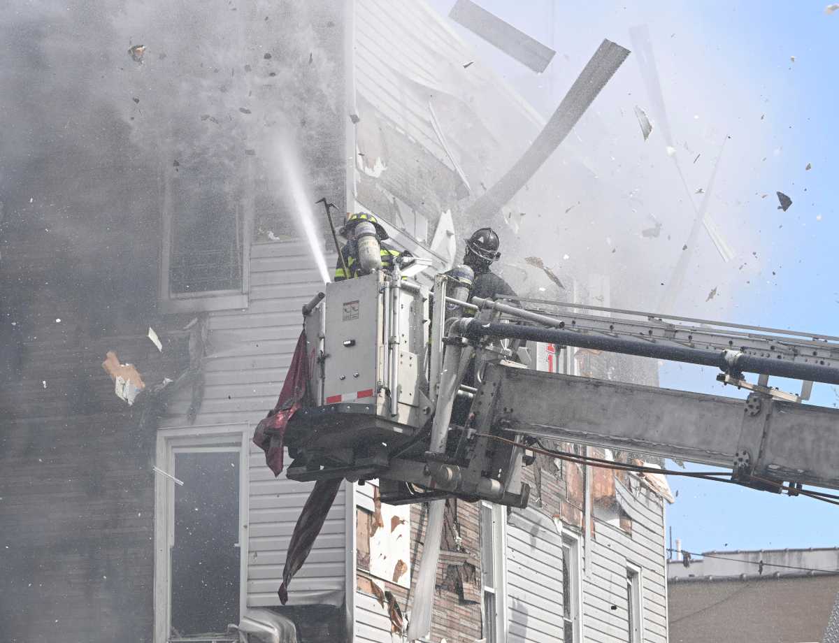Firefighters battle fire at Queens building