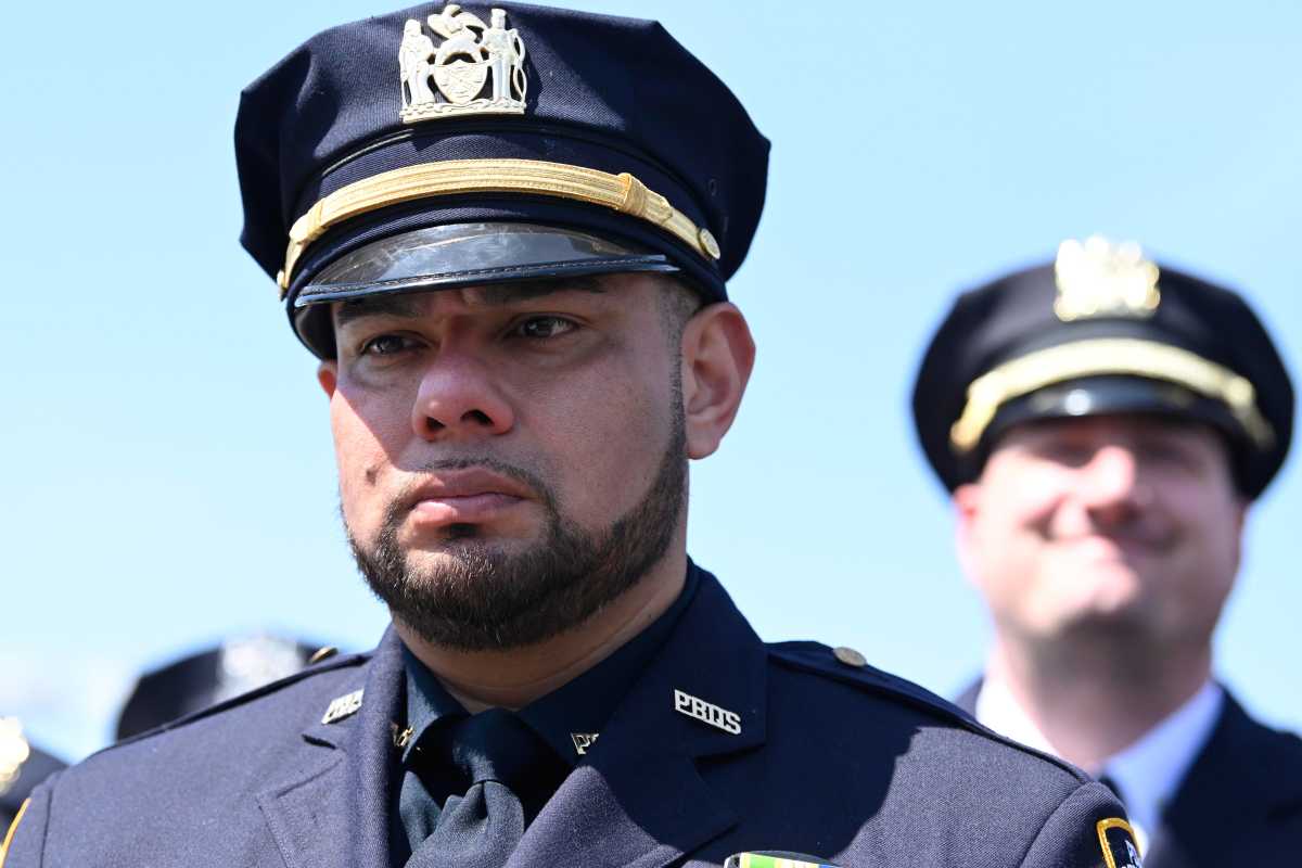 NYPD unveils memorial at new Queens precinct honoring officer shot dead last year 5
