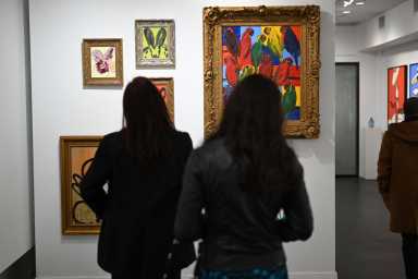 Guests checking out art salon