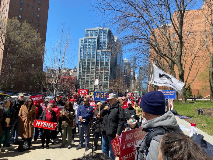 John Rowan, former national president of Vietnam Veterans of America, urges rally participants to support efforts to keep VA hospitals open and fully staffed for the benefit of veterans and their families.