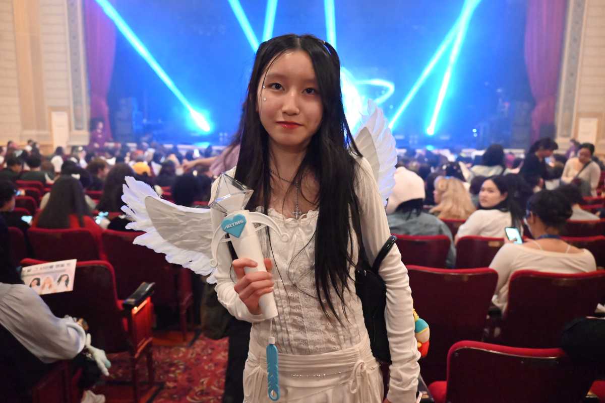 An ARTMS fan dressed up in angel wings for the show.
