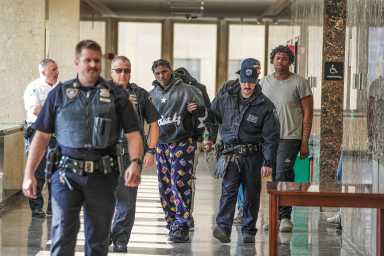 Gang members in Manhattan gun violence indictment escorted by cops