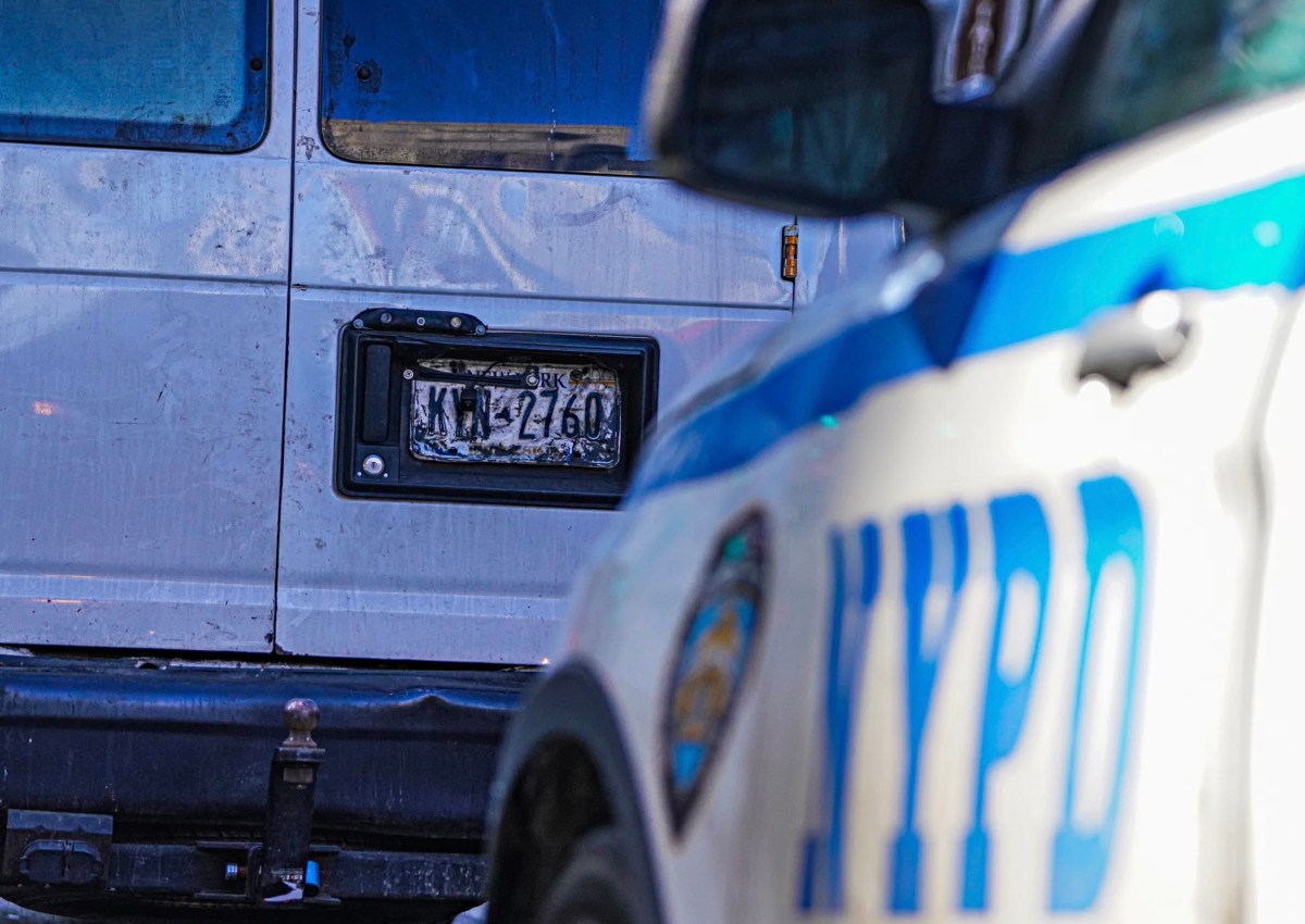 Van with dirty license plates stopped by NYPD car in NYC