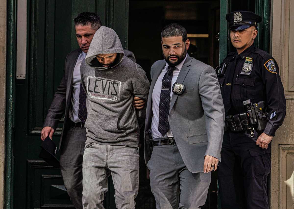 Suspect in City Hall stabbing escorted from NYPD stationhouse by detectives