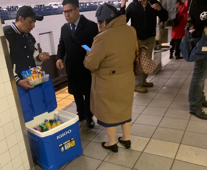 From churros to chaos? Illegal NYC subway vendors struggle for legitimacy as some riders fume over presence 3 a many selling snacks on a subway platform in one of many NYC subway stations