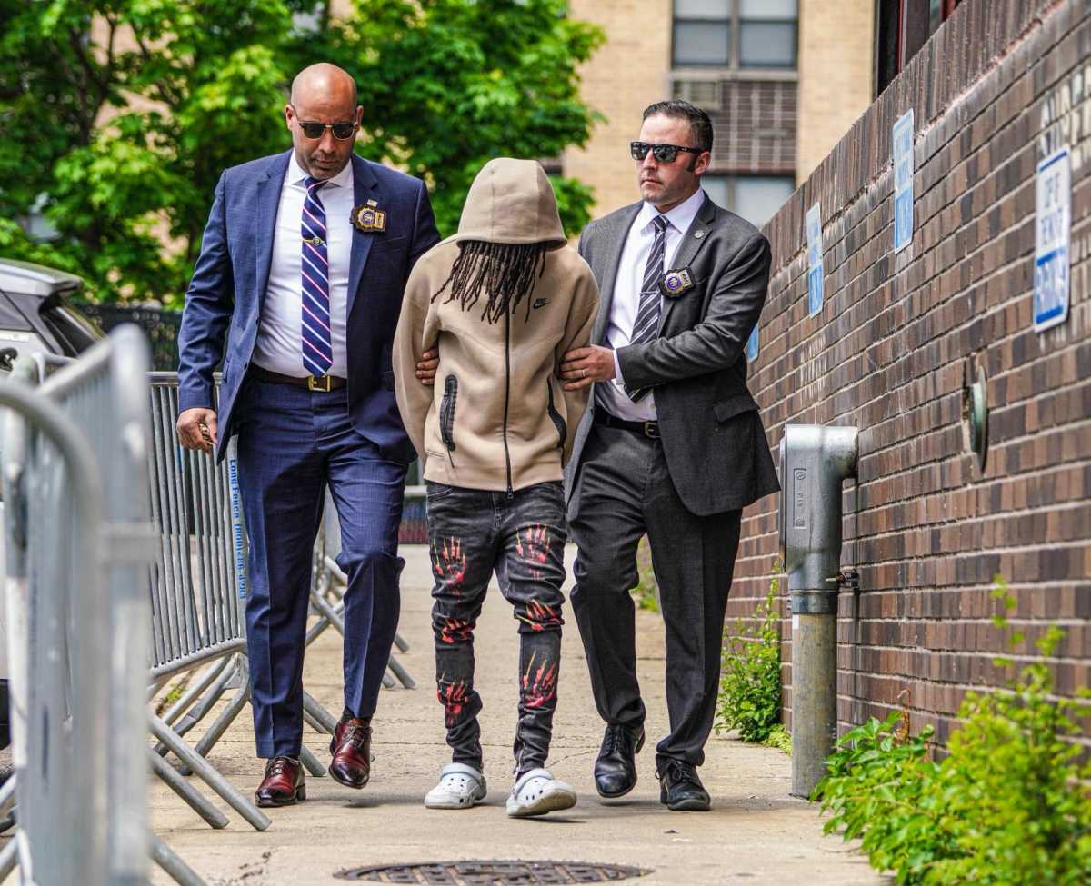 Driver who allegedly killed beloved Bronx football coach during pileup turns himself in 2