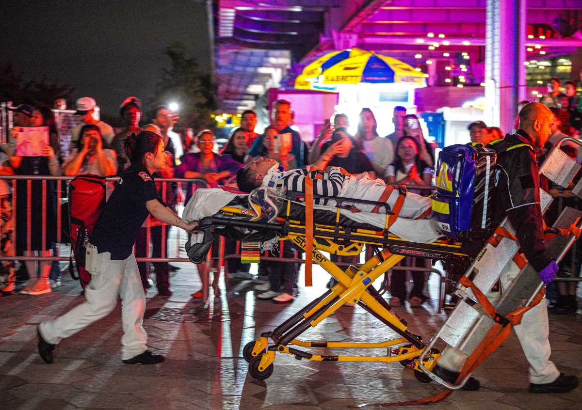 First responders rescue man on stretcher after ship crashed into Brooklyn Bridge