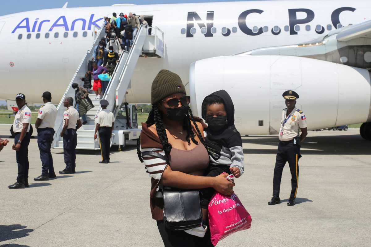 Haitian migrants arriving in Haiti