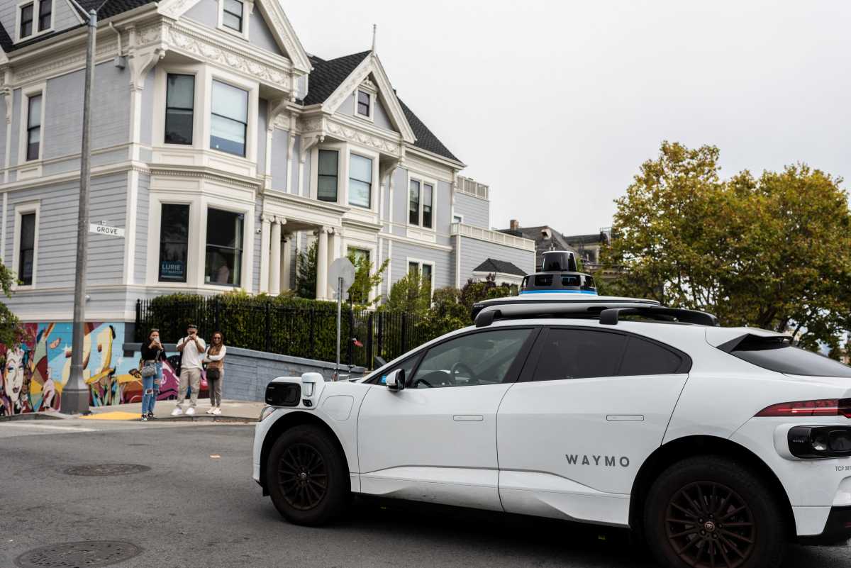 A Waymo autonomous vehicle: Uber has partnered with the self-driving car company to offer driverless rides in cities like Austin, Phoenix, and soon Atlanta