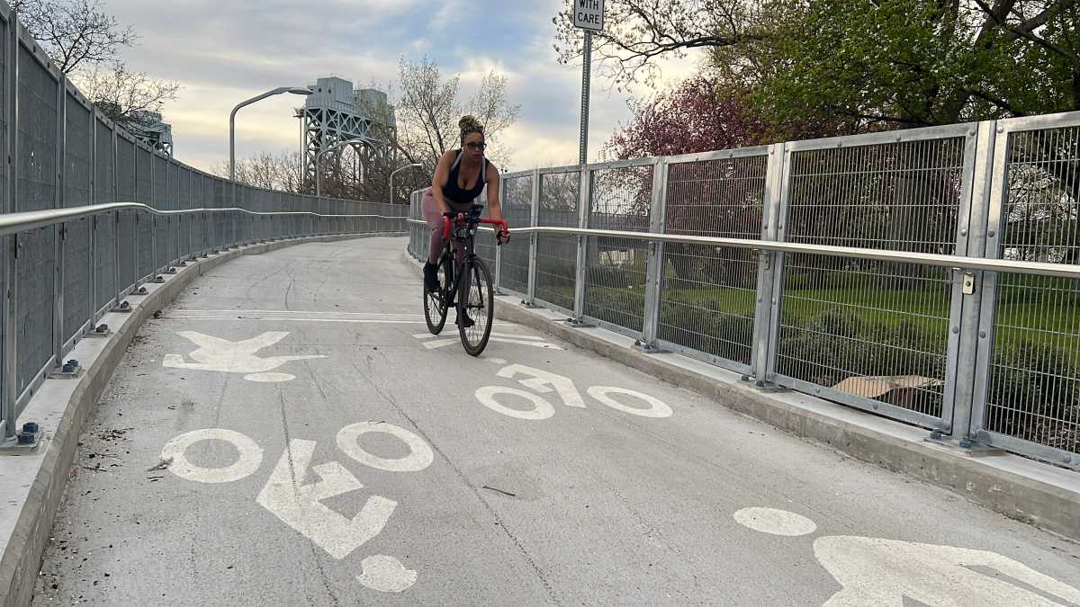 woman riding bike on MTA RFK Triborough Bridge bike path