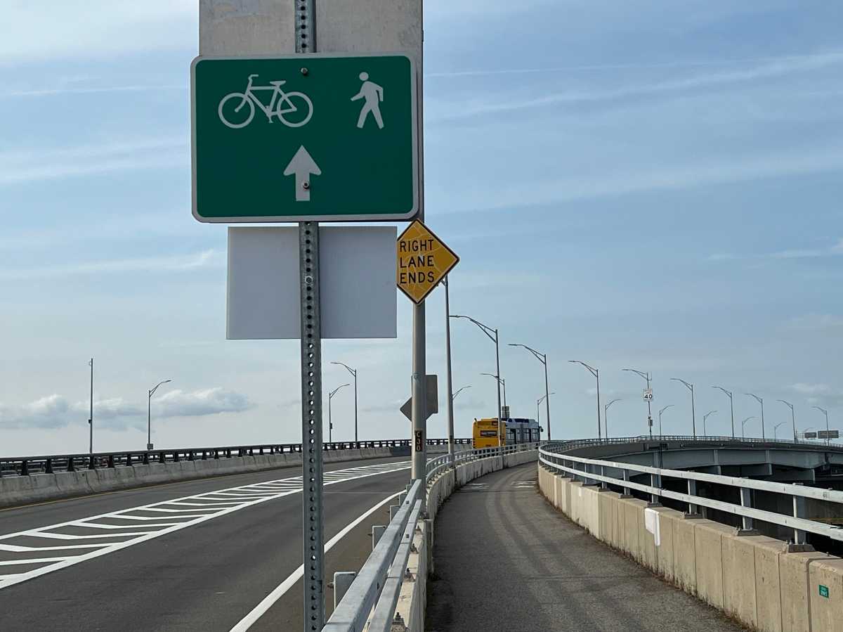 a road in NYC with a bike path