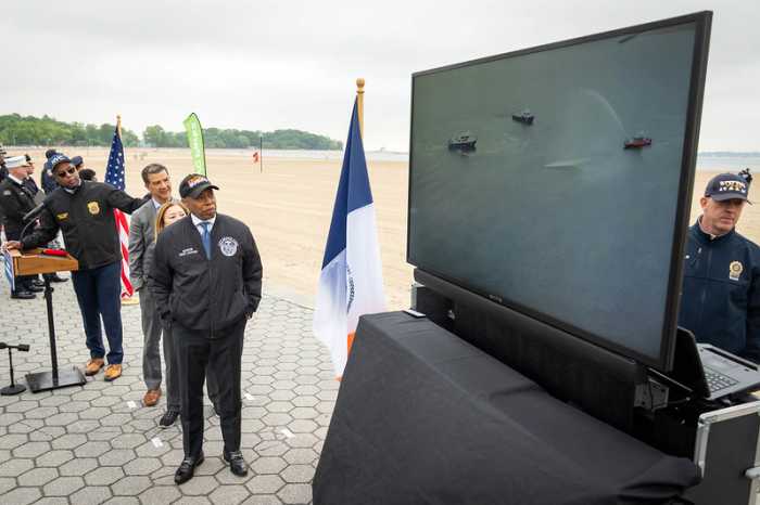 Mayor Eric Adams watches on as emergency responders demonstrate a rescue drone at Orchard Beach. He joked that his voice should be used in the drone’s speaker system because it is “calming.”