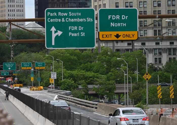 roads and street signs in Manhattan during congestion pricing