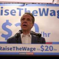 NYC Mayor's Race: Front-runner Cuomo pledges to push state to raise city minimum wage to $20 per hour 6 Former Gov. Andrew Cuomo speaking at podium about increasing minimum wage in NYC
