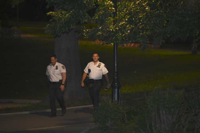 Officers canvas Highland Park in Cypress Hills, Brooklyn following a shooting on Sunday, May 18.