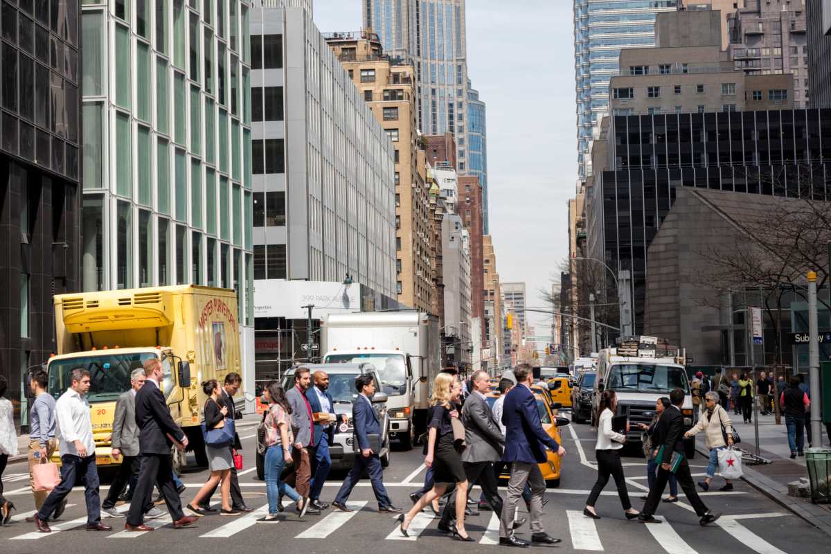 Offices in Manhattan with people walking about