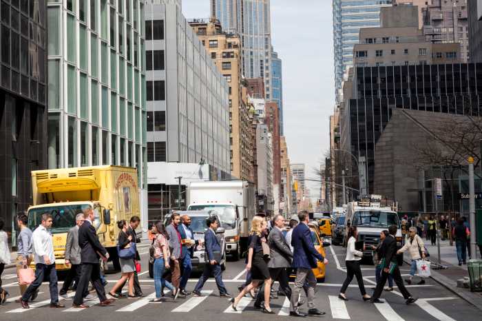Offices in Manhattan with people walking about