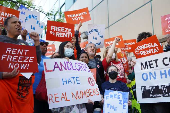 Members of the New York State Tenant Bloc rally outside the Rent Guidelines Board meeting at LaGuardia Performing Arts Center on April 30, demanding a rent freeze