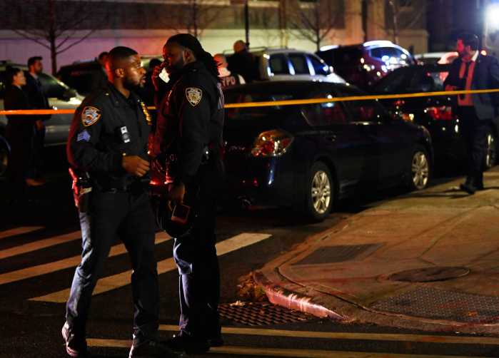 Police at scene of stabbing in Harlem