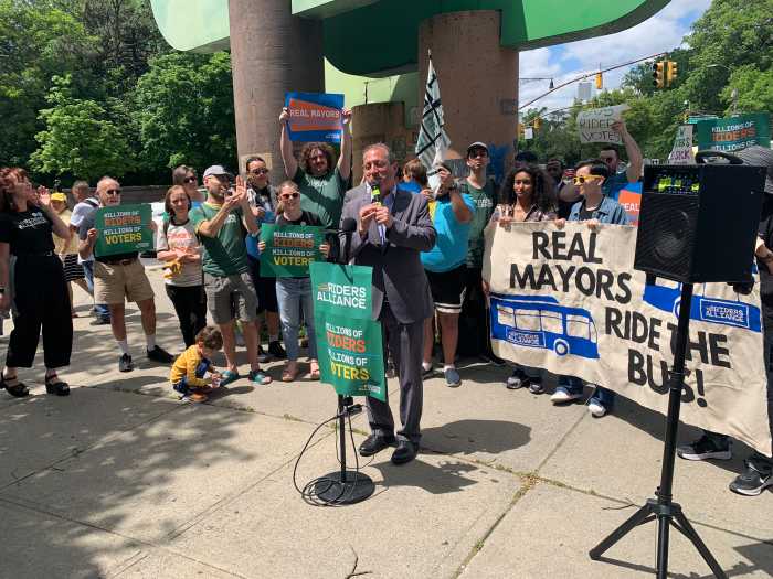 Brooklyn bus service rally goes political as NYC mayoral candidates slam Adams, Cuomo over slow service for New Yorkers 3 group of people on a sidewalk advocating for better bus service