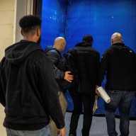 ICE agents seize immigrants inside Manhattan federal building housing immigration court 4 group of men in front of a blue background
