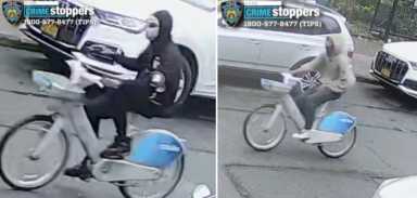two people riding Citi Bikes in the Bronx