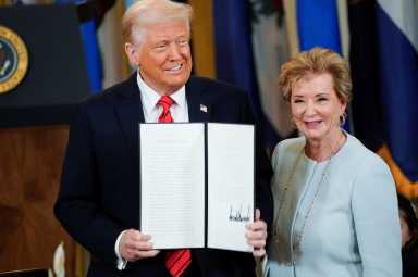 U.S. President Donald Trump signs an executive order to shut down the Department of Education