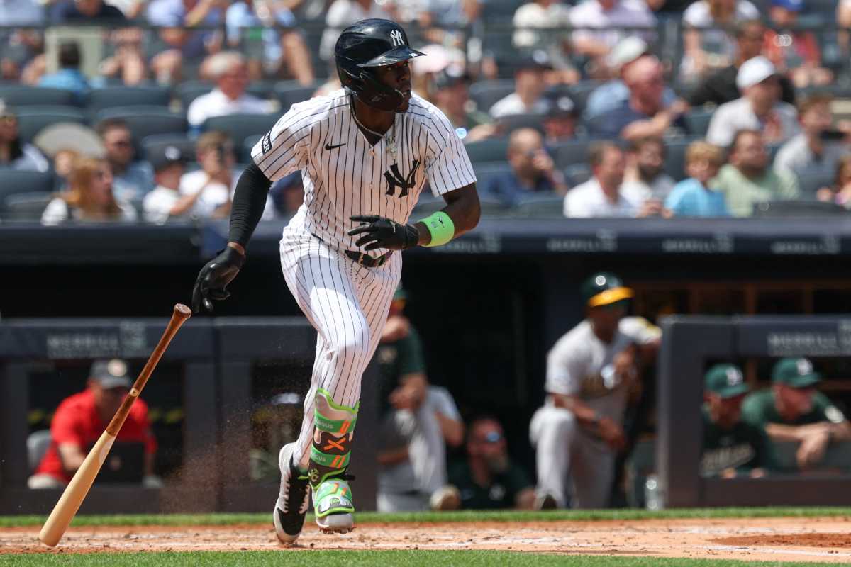 Yankees turn into Bash Brothers as Judge, Chisholm hit homers to crush the Athletics 2 Yankee player dropping bat while running bases in front of fans