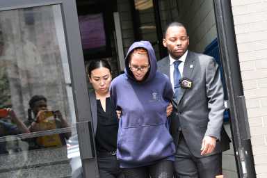 Brooklyn hit-and-run murder suspect led out of precinct by police