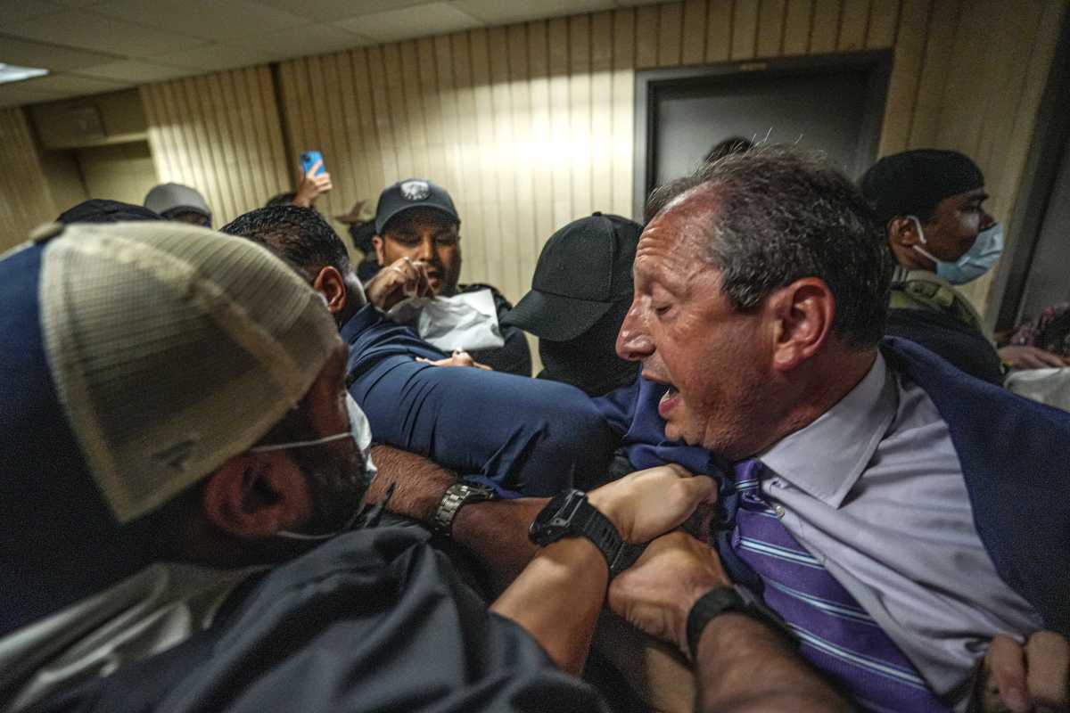 Brad Lander being arrested by ICE officials