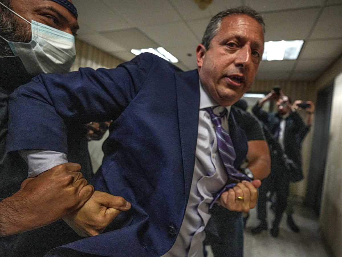 Brad Lander being arrested