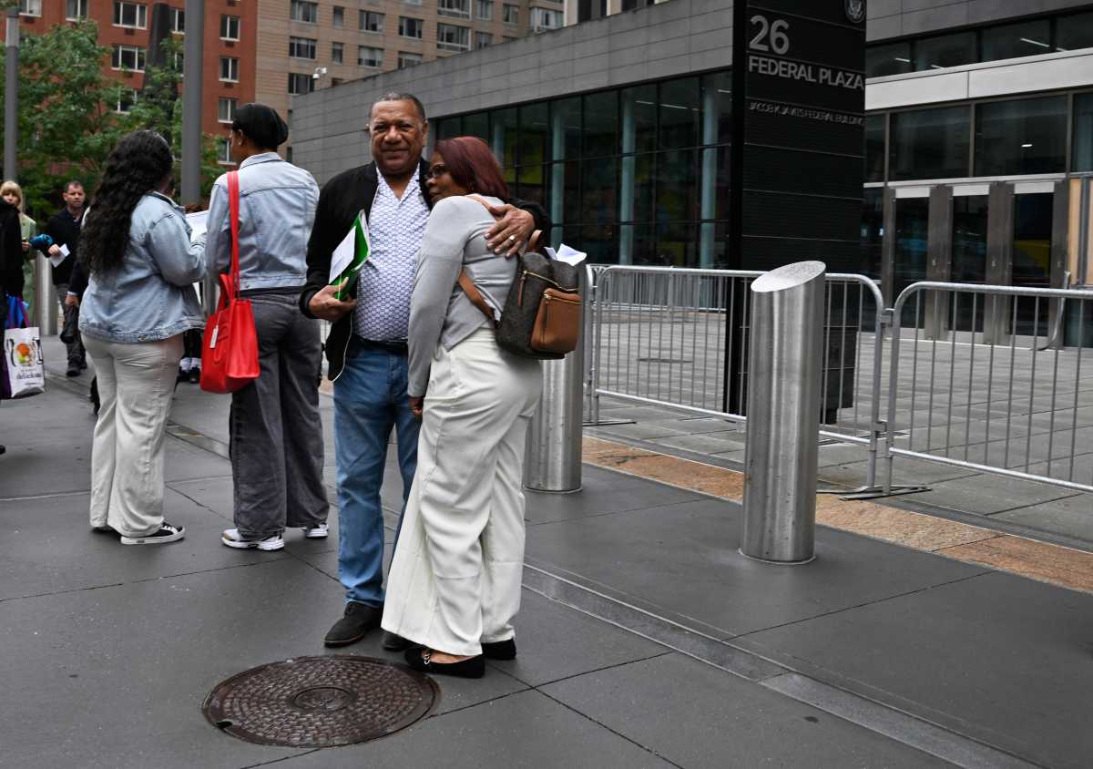 Legal Aid Society condemns ICE raids at NYC immigration courts 2 People wait on line outside ICE facility in Manhattan