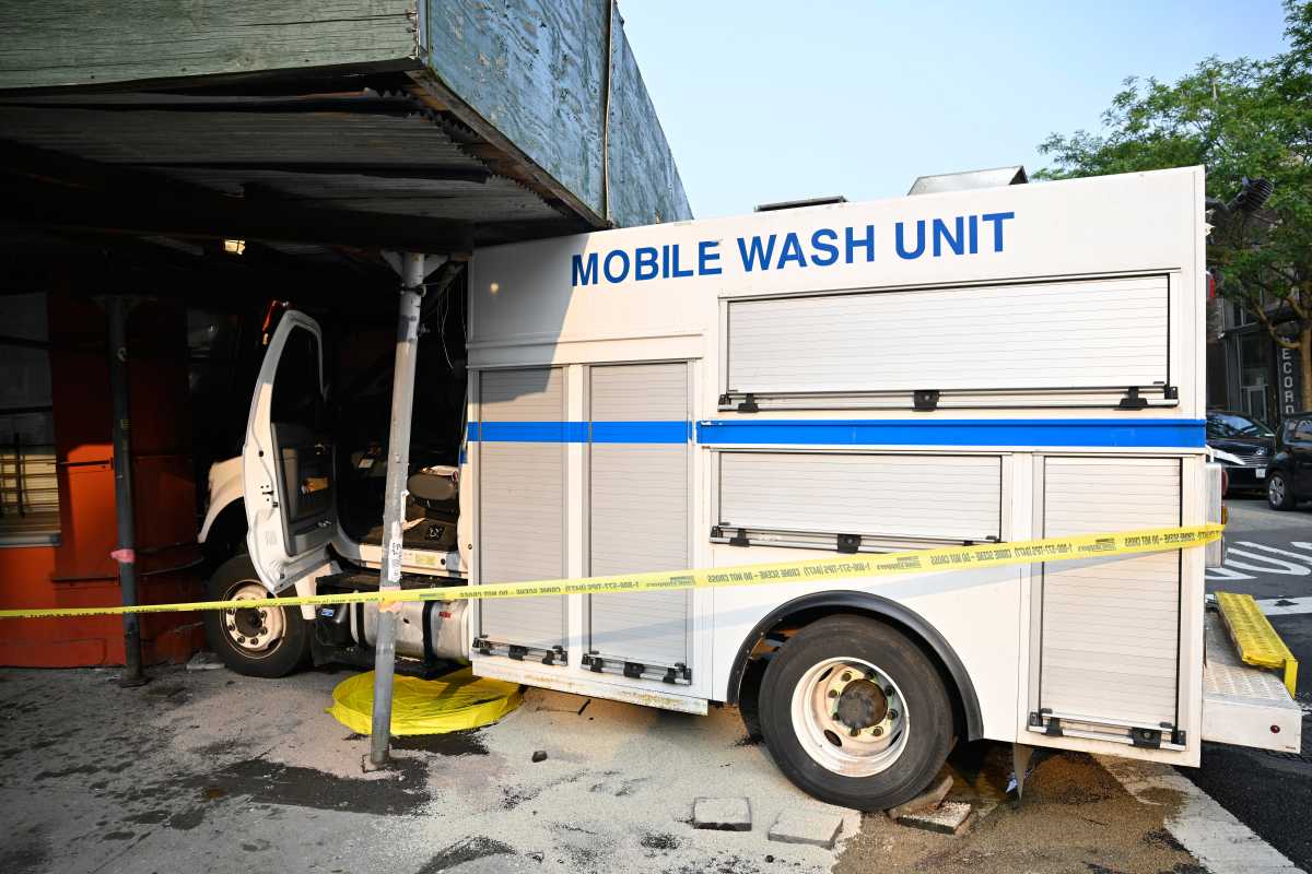 white truck crash into a Brooklyn building