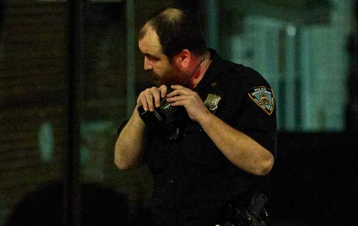 Police radio held by officer