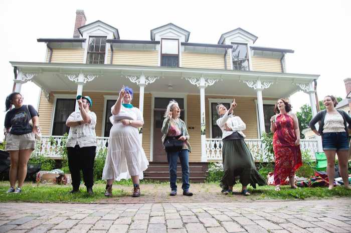 The Folk Music Society of New York performs at the 2024 "Porch Stomp" folk music festival on Governors Island.