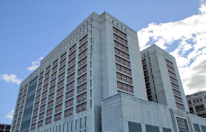 metropolitan detention facility (jail prison building in industry city sunset park brooklyn new york) famous criminals accused of crime awaiting trial federal holding area bricked up red brick windows