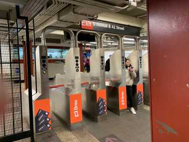 ads on MTA subway turnstiles