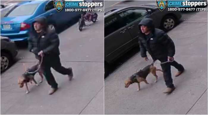 Photo released by the NYPD shows the alleged suspect walking a dog near the scene of the stabbing in Washington Heights on April 16, 2025.