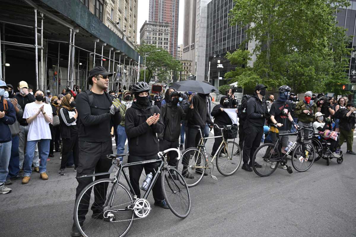 Protesters wearing masks at an ICE demonstration in Manhattan