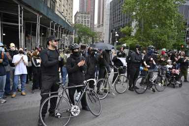 Protesters wearing masks at an ICE demonstration in Manhattan