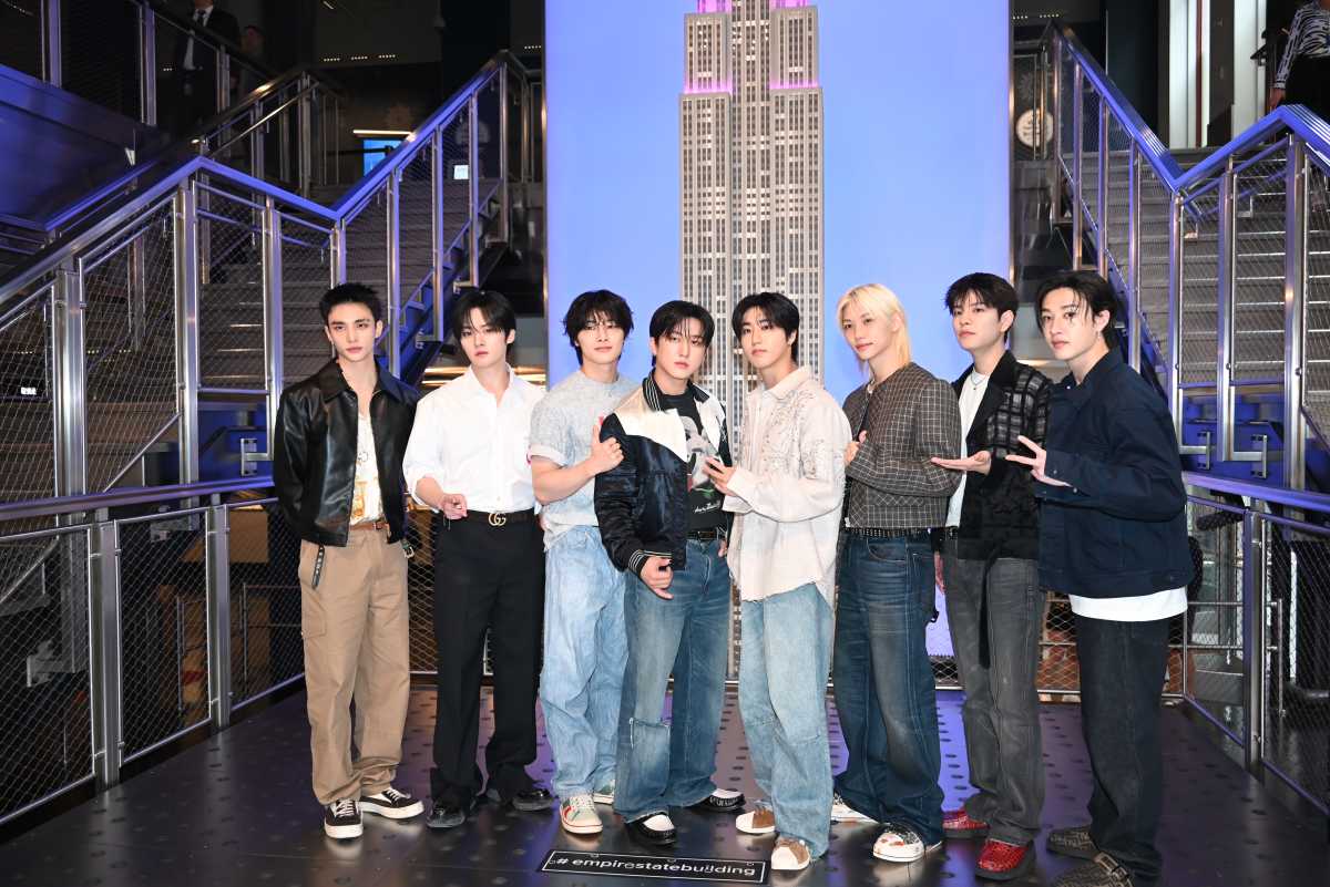 The K-pop group Stray Kids at the Empire State Building.