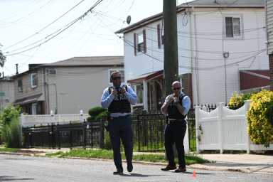 Police at scene in Queens where woman was shot dead