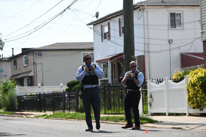 Police at scene in Queens where woman was shot dead