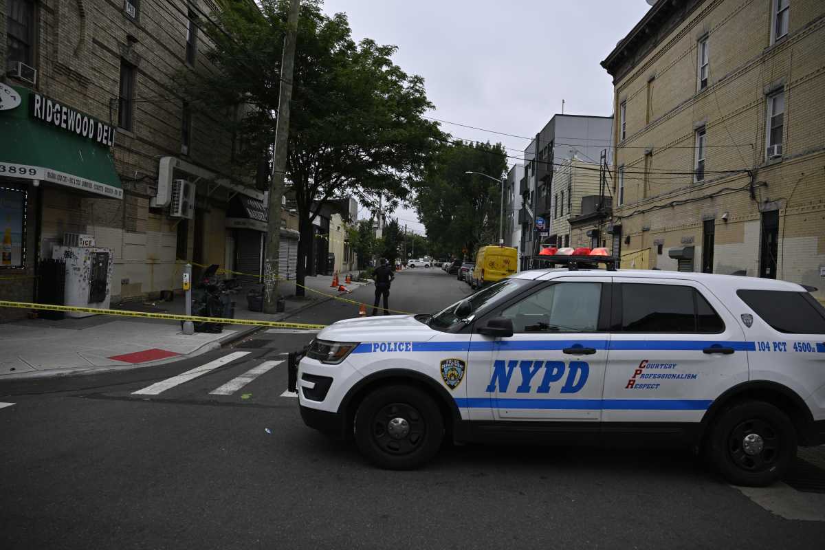 Police at Queens crime scene where man was stabbed to death