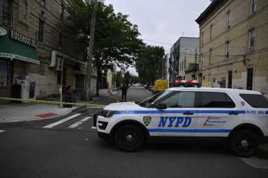 Police at Queens crime scene where man was stabbed to death