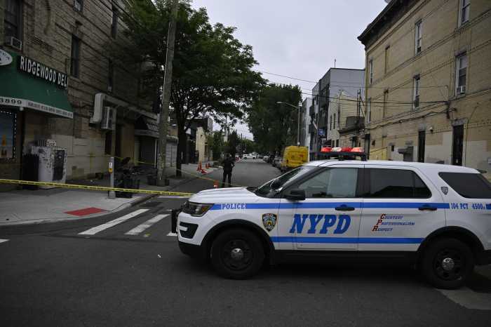 Police at Queens crime scene where man was stabbed to death