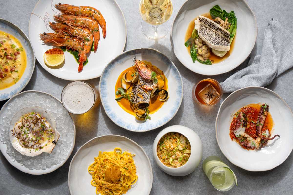 an array of seafood dishes from Midtown's Point Seven